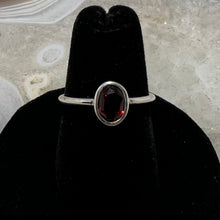 Load image into Gallery viewer, Garnet Oval Faceted Bezel Set Ring (Size 6.5)