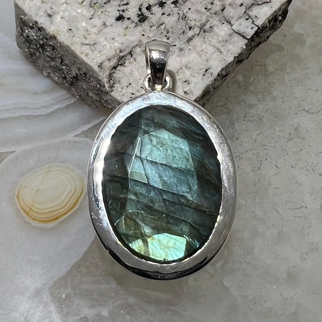 Labradorite Faceted Oval Pendant Bezel Set with Cutout Detailing